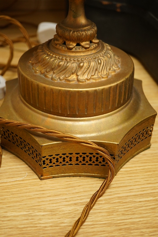 A pair of ruby glass, enamel and gilt metal table lamps, 57cm